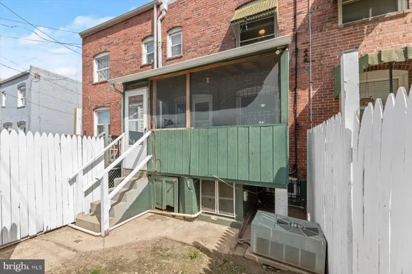 a front view of a house with a garage