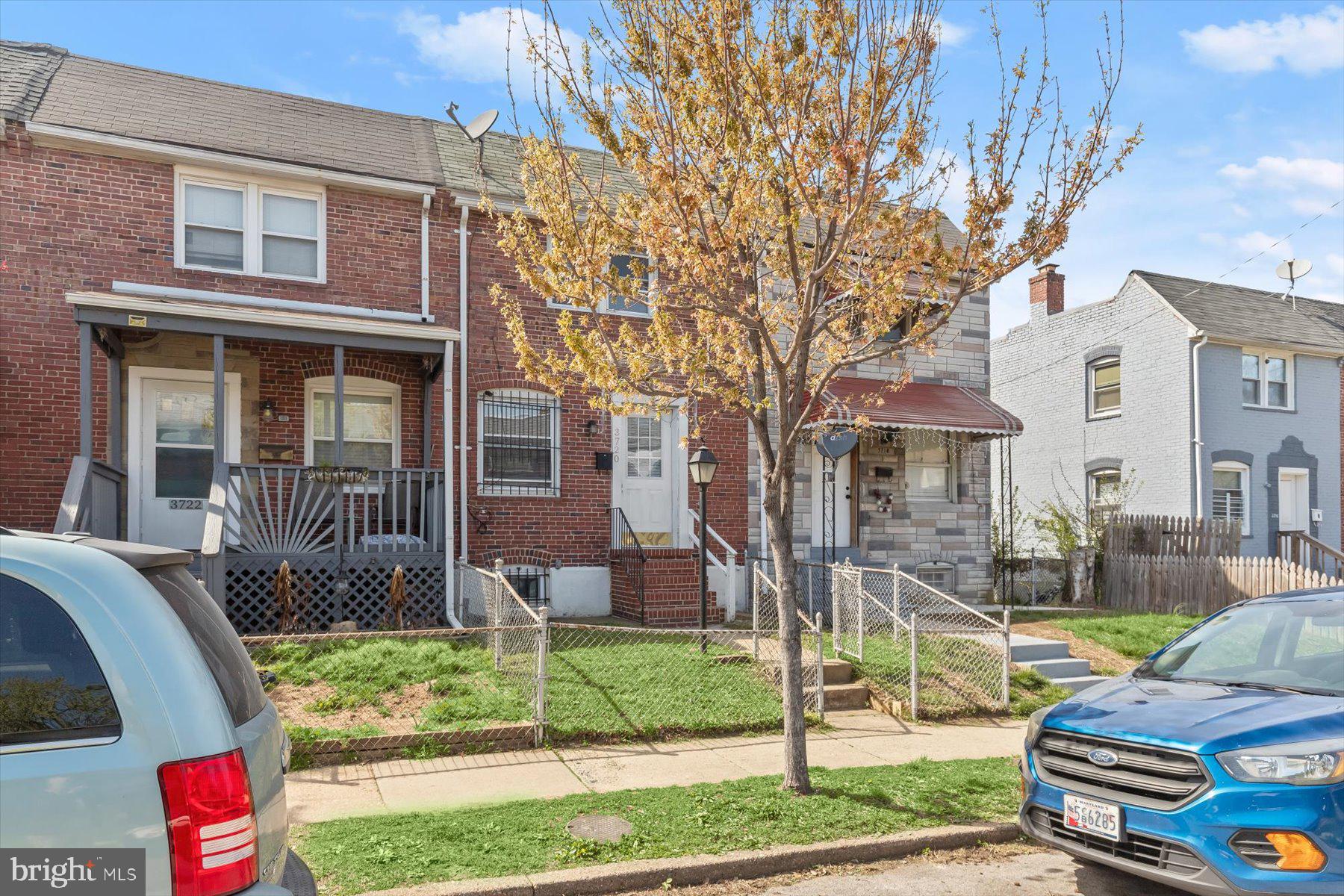 3720 St Victor Street Baltimore, MD 21225 - Photo 38 of 41 a front view of a house with garden