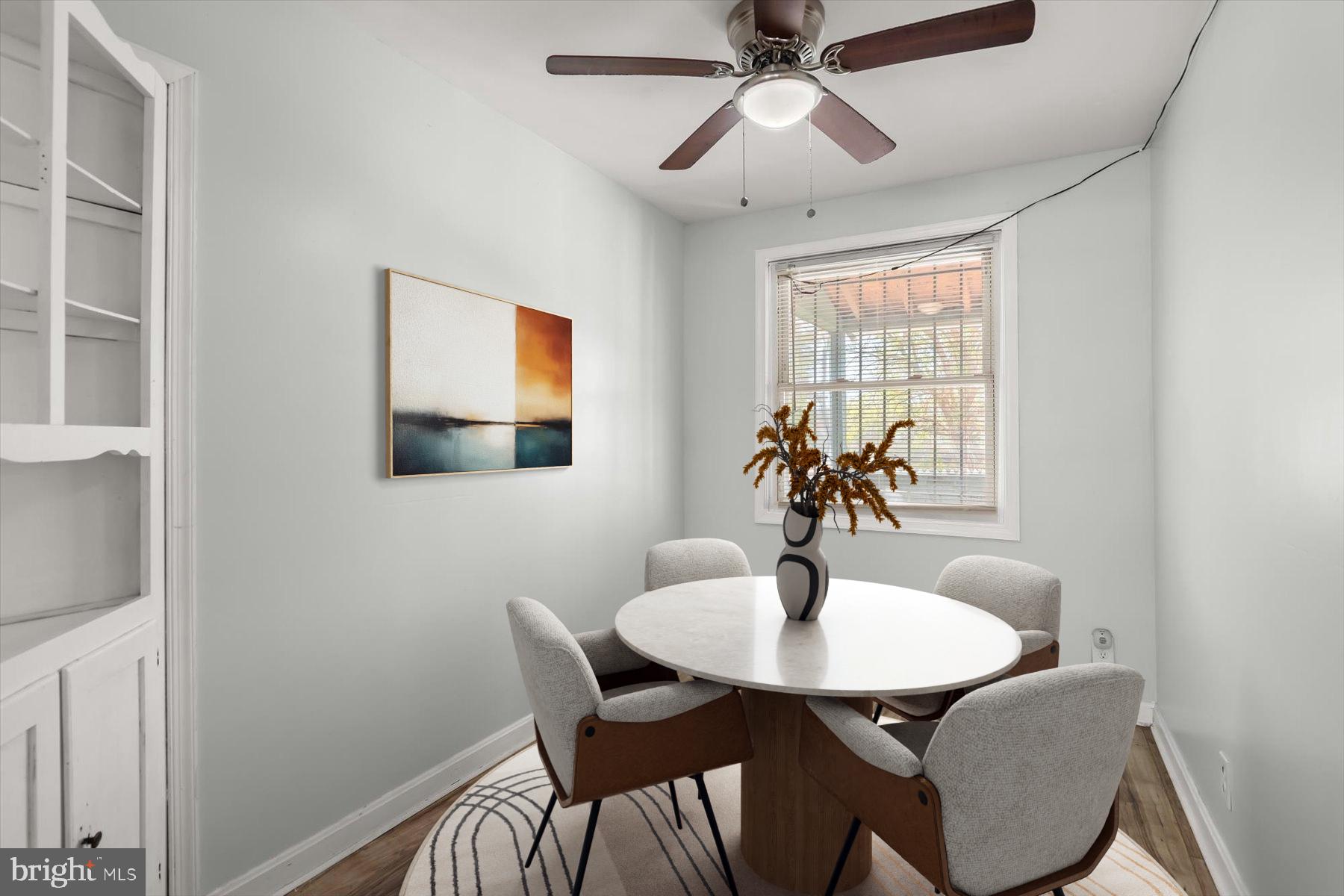 3720 St Victor Street Baltimore, MD 21225 - Photo 9 of 41 a dining room with furniture and window