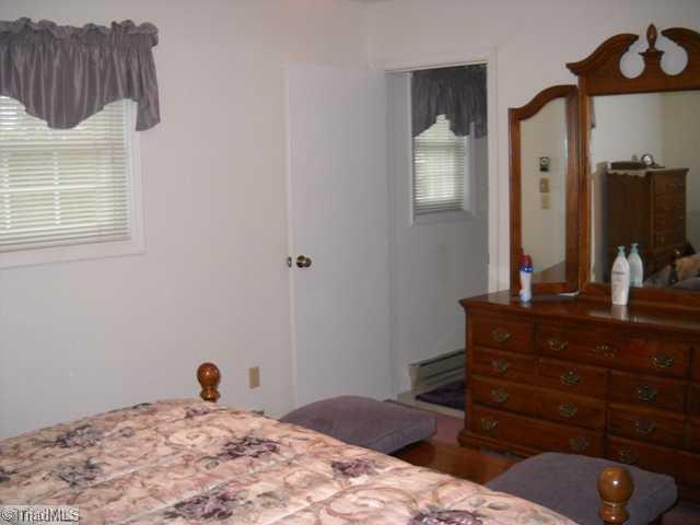 7105 Kingston Road Trinity, NC 27360 - Photo 11 of 16 Master Bedroom. 2nd view of Master Bedroom showing entrance to half bath.