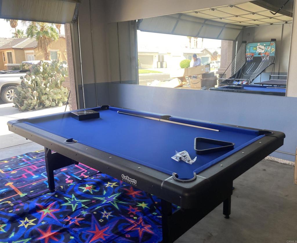 80596 Key Largo Avenue Indio, CA 92201 - Photo 37 of 59 a room with pool table and a window