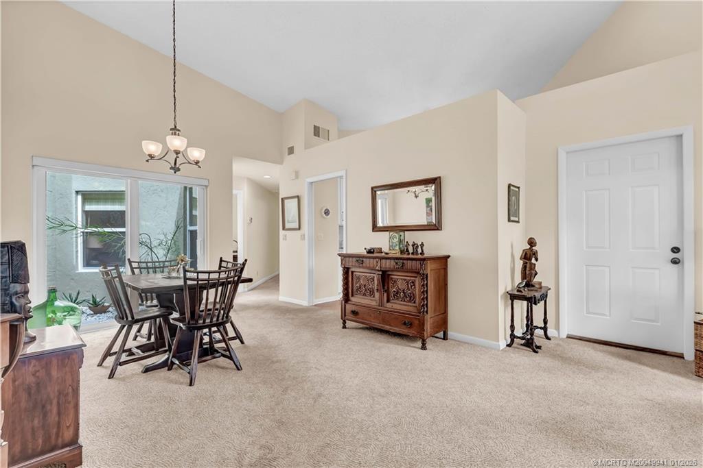 2437 Southwest Foxpoint Trail Palm City, FL 34990 - Photo 12 of 32 a view of a livingroom with furniture