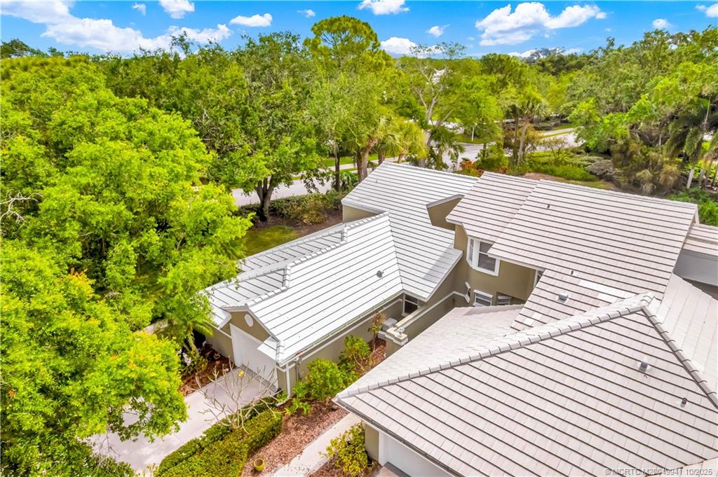 2437 Southwest Foxpoint Trail Palm City, FL 34990 - Photo 26 of 32 a view of a balcony with two chairs