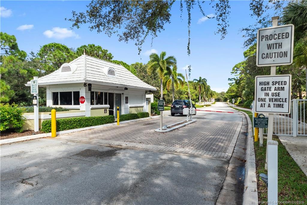 2437 Southwest Foxpoint Trail Palm City, FL 34990 - Photo 32 of 32 a view of outdoor space yard and front view of a house