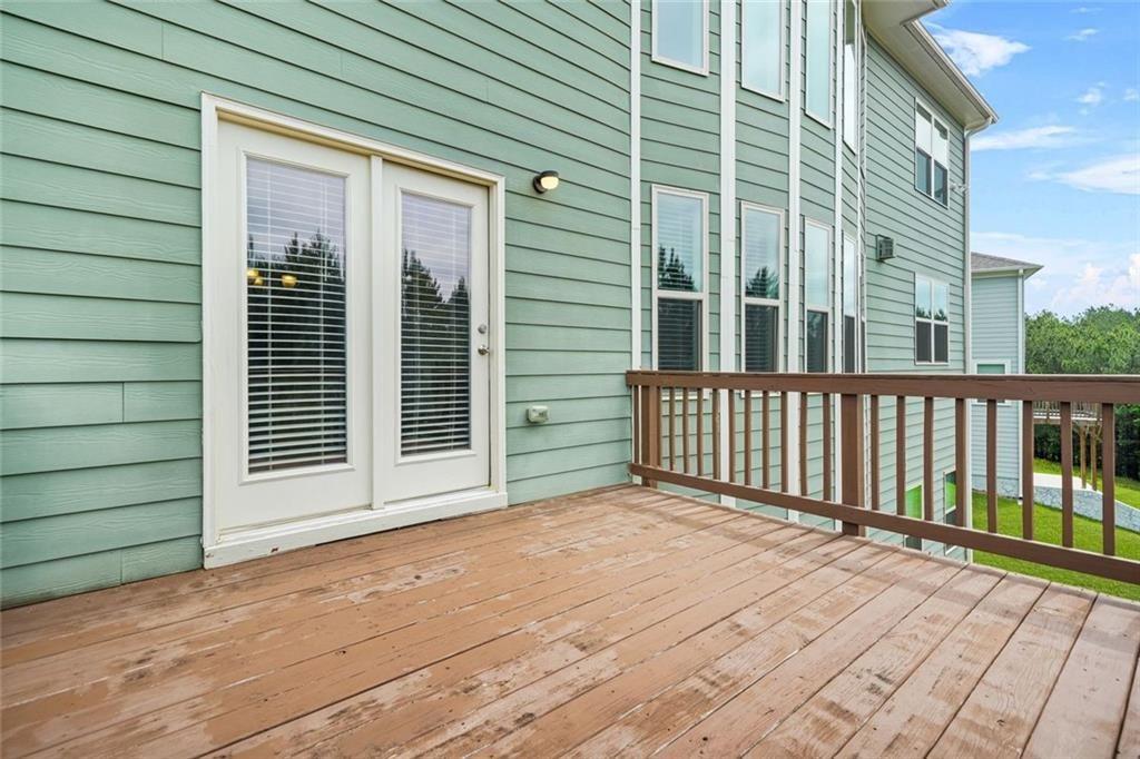 1606 Chancery Lane Lithia Springs, GA 30122 - Photo 28 of 66 a view of a house with a porch