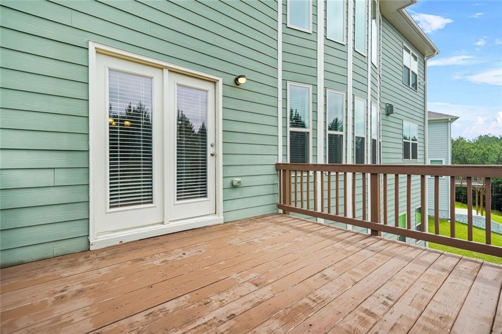1606 Chancery Lane Lithia Springs, GA 30122 - Photo 29 of 66 a view of a house with a porch