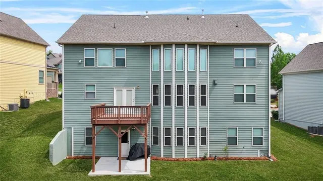 a bed room with a bed and a window