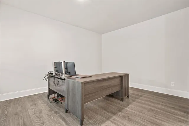 a living room with a rug