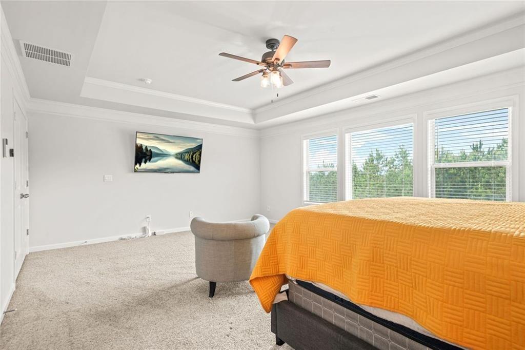 1606 Chancery Lane Lithia Springs, GA 30122 - Photo 45 of 66 a bed room with a bed and a window