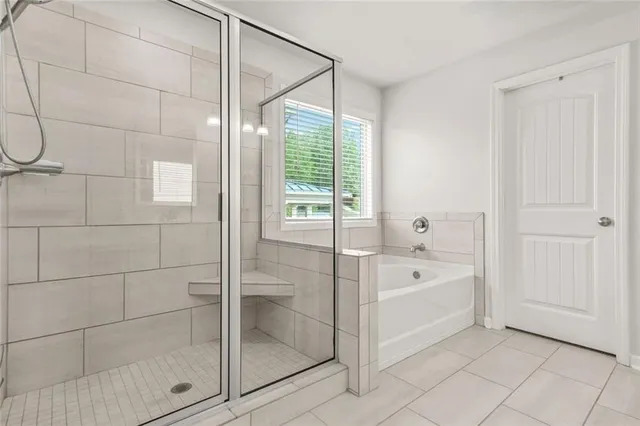 a view of backyard with a garden and deck