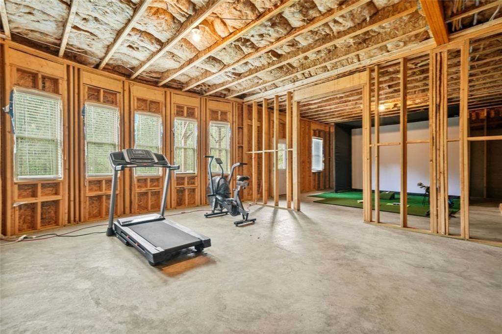 1606 Chancery Lane Lithia Springs, GA 30122 - Photo 57 of 66 a view of a room with gym equipment