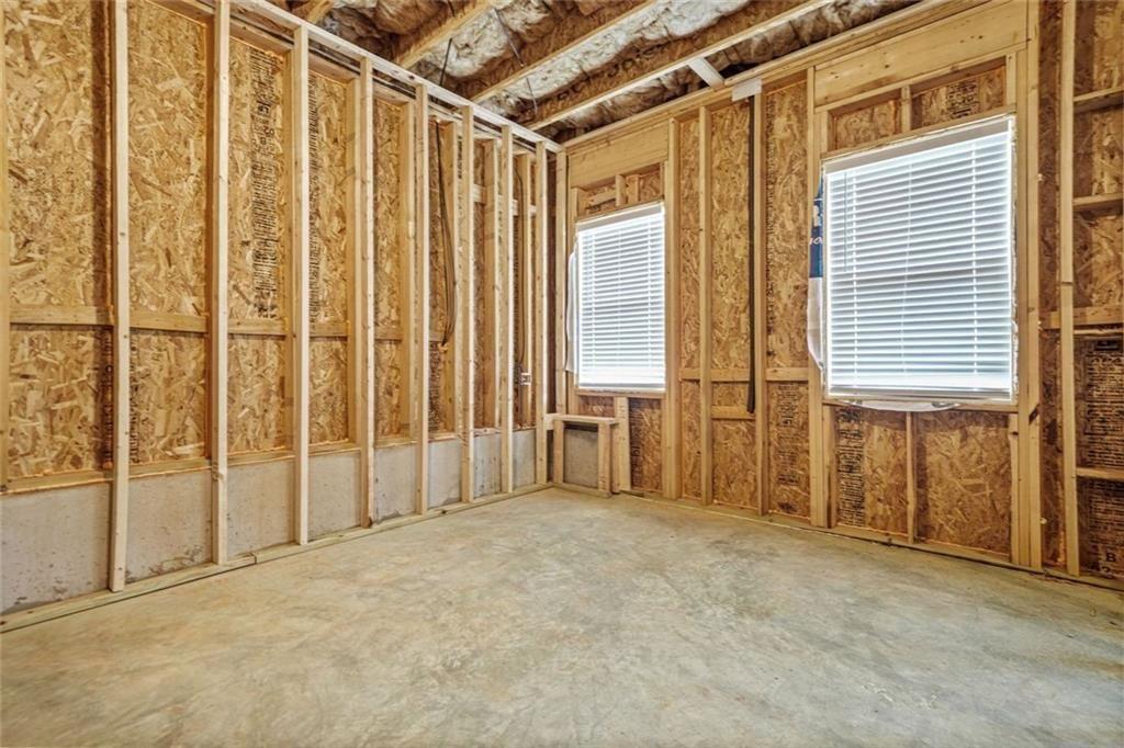 1606 Chancery Lane Lithia Springs, GA 30122 - Photo 59 of 66 a view of an empty room with a window