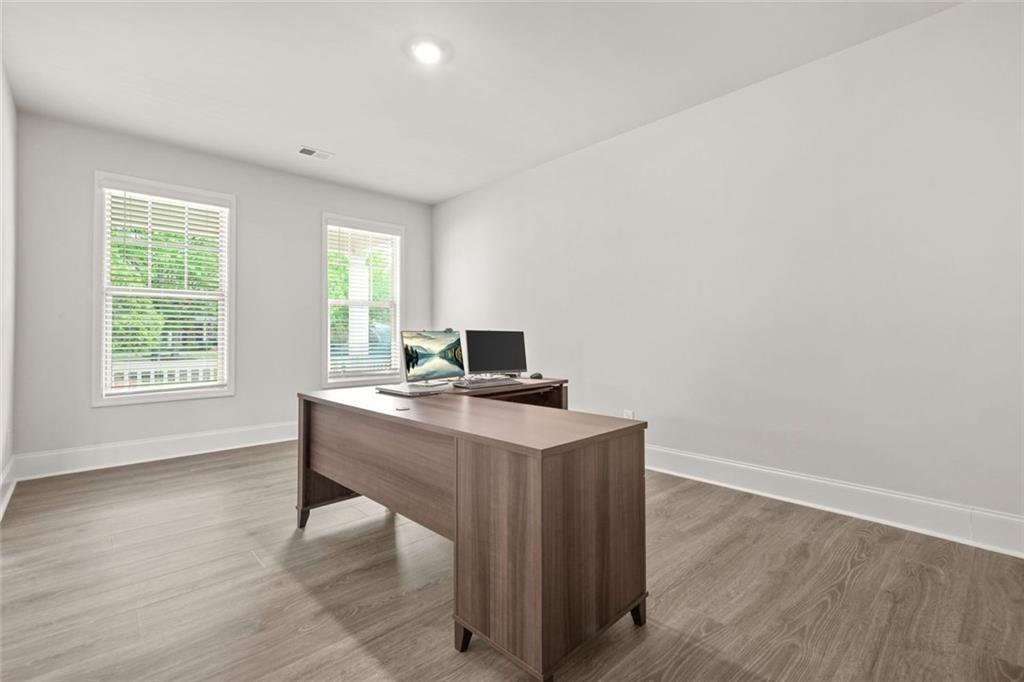1606 Chancery Lane Lithia Springs, GA 30122 - Photo 6 of 66 a workspace with furniture and window