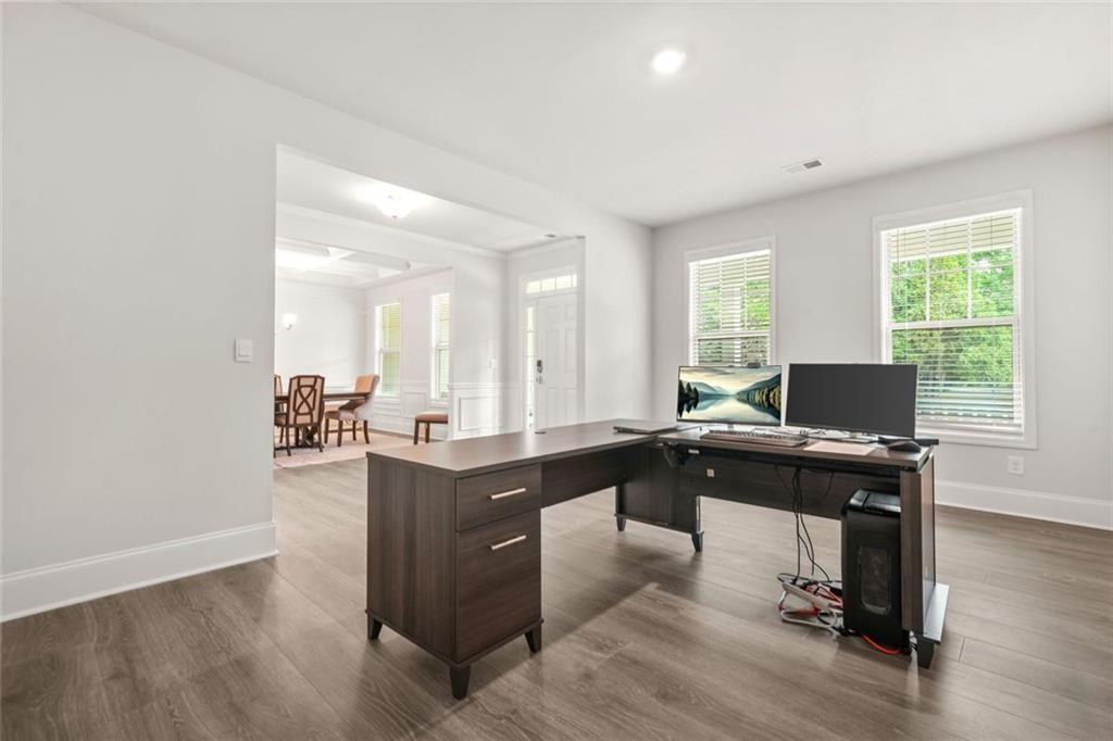 1606 Chancery Lane Lithia Springs, GA 30122 - Photo 7 of 66 a view of a workspace with furniture and a window