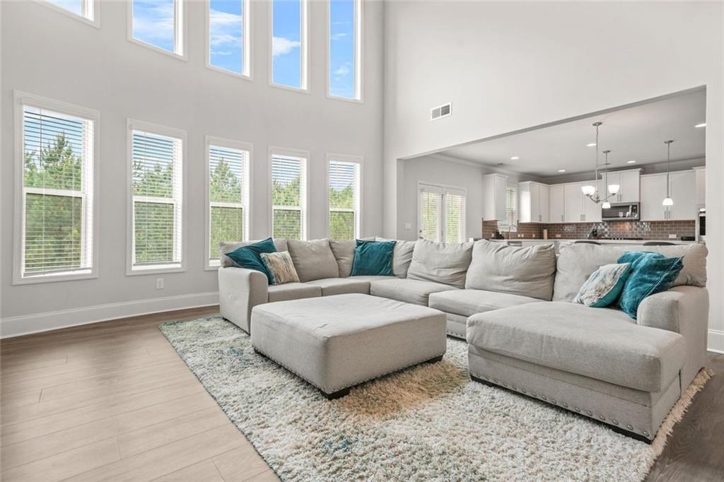 1606 Chancery Lane Lithia Springs, GA 30122 - Photo 9 of 66 a living room with furniture and a large window