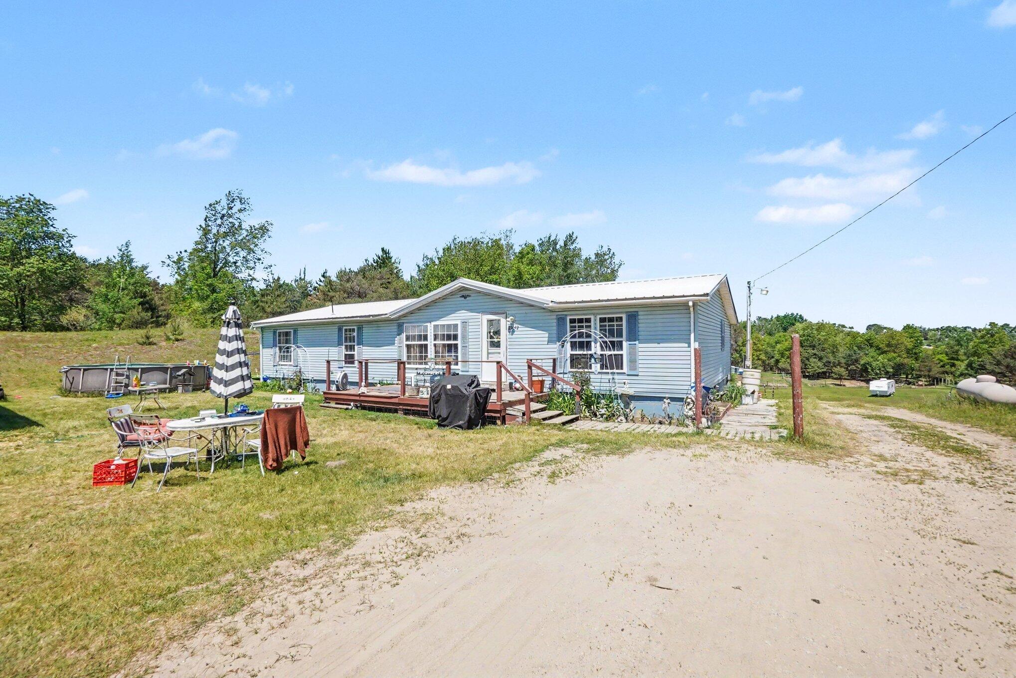 22092 3 Mile Road Reed City, MI 49677 - Photo 5 of 25 005_file_7155