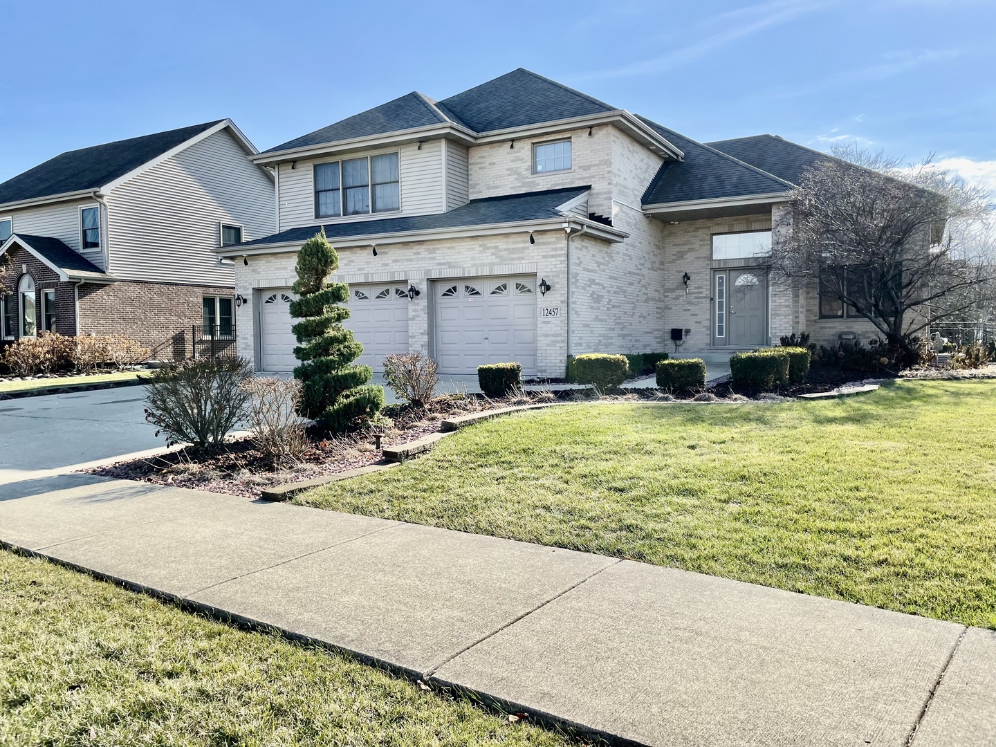 a large house with swimming pool in front of it