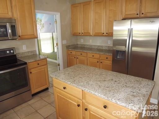 13518 Northbourne Road Huntersville, NC 28078 - Photo 15 of 15 a kitchen with white cabinets and stainless steel appliances