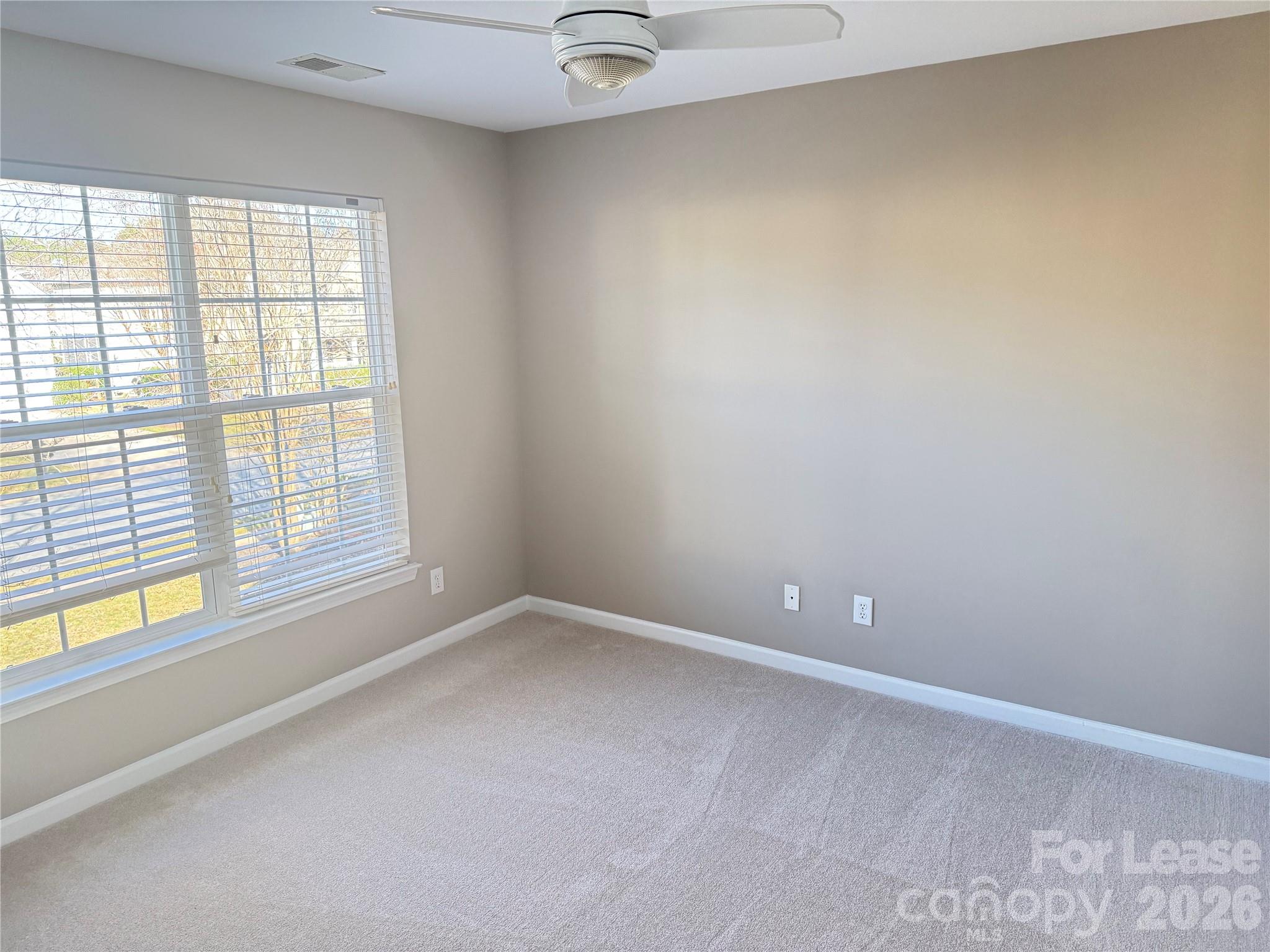 13518 Northbourne Road Huntersville, NC 28078 - Photo 9 of 15 a view of an empty room with a window