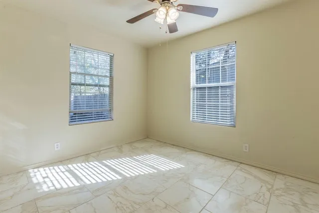 an empty room with windows