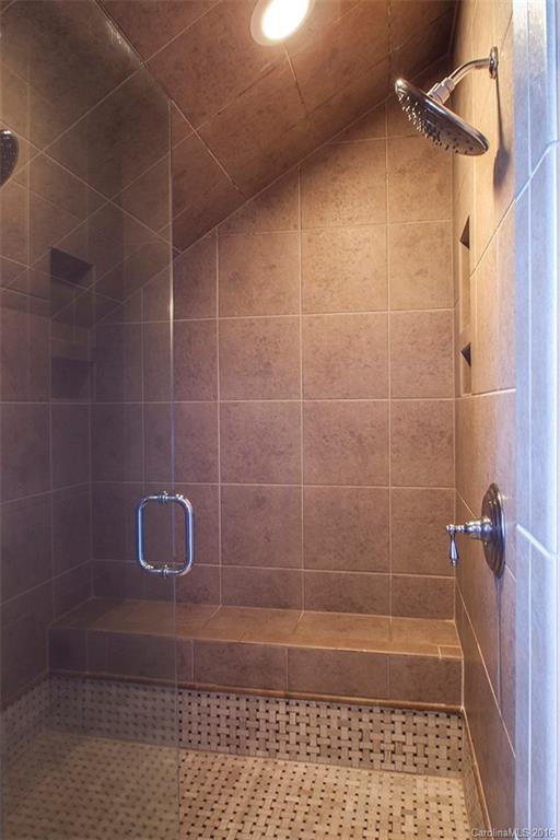 2220 Vail Avenue Charlotte, NC 28207 - Photo 13 of 23 a bathroom with a shower