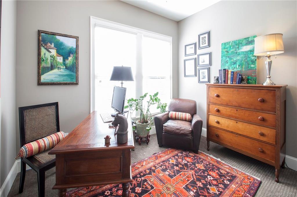 2220 Vail Avenue Charlotte, NC 28207 - Photo 15 of 23 a living room with furniture and a window