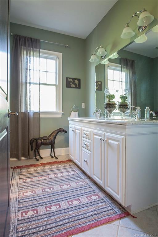 2220 Vail Avenue Charlotte, NC 28207 - Photo 17 of 23 a room with a sink cabinets and a window