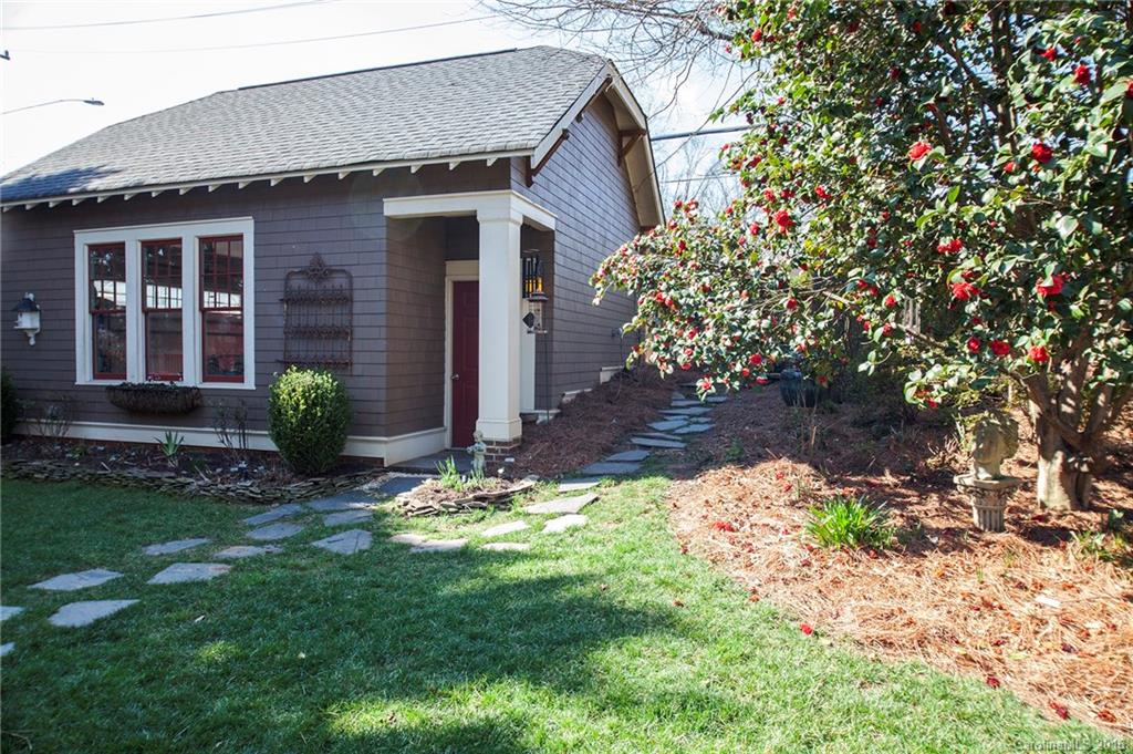 2220 Vail Avenue Charlotte, NC 28207 - Photo 20 of 23 a front view of a house with a yard