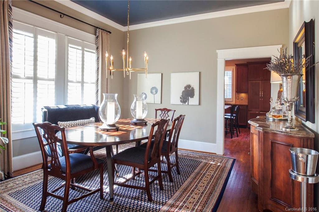 2220 Vail Avenue Charlotte, NC 28207 - Photo 3 of 23 a view of a dining room with furniture window and wooden floor