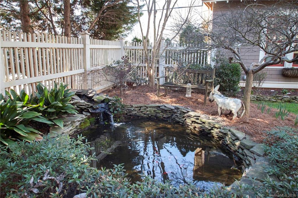 2220 Vail Avenue Charlotte, NC 28207 - Photo 21 of 23 a view of a house with a yard and plants