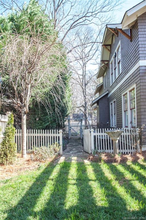 2220 Vail Avenue Charlotte, NC 28207 - Photo 22 of 23 a backyard of a house with table and chairs