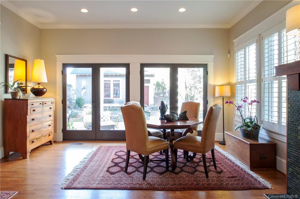 2220 Vail Avenue Charlotte, NC 28207 - Photo 7 of 23 a view of a dining room with furniture window and wooden floor