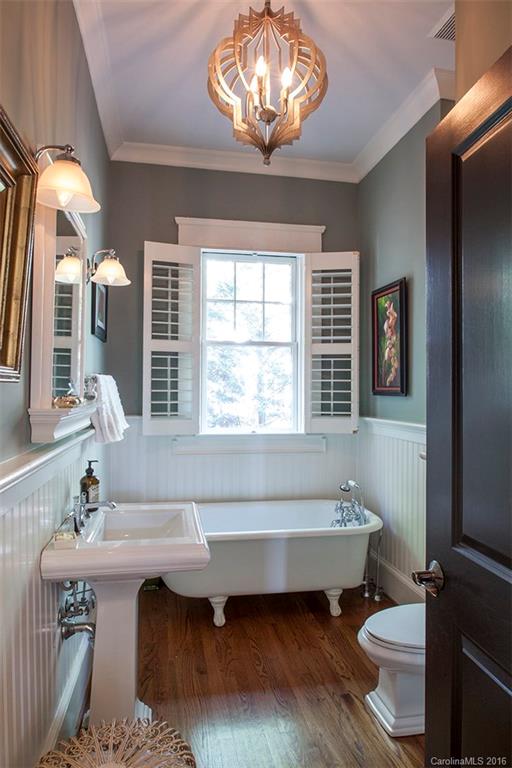 2220 Vail Avenue Charlotte, NC 28207 - Photo 8 of 23 a bathroom with a sink and a bathtub