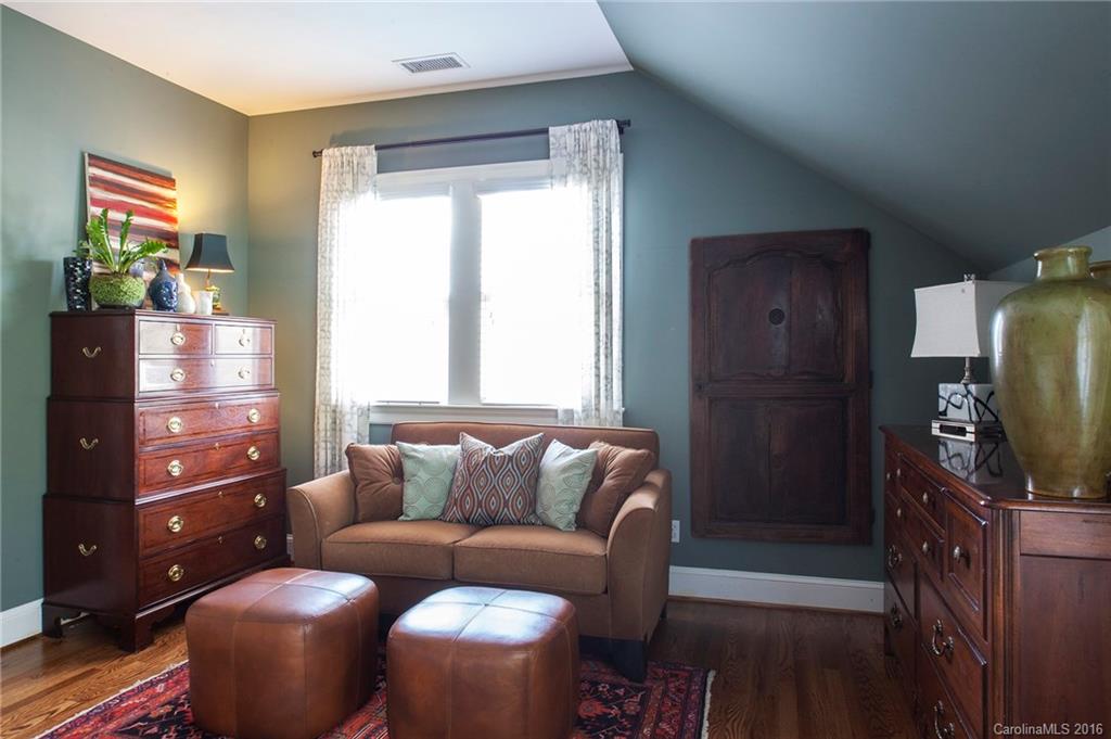2220 Vail Avenue Charlotte, NC 28207 - Photo 10 of 23 a living room with furniture and a flat screen tv