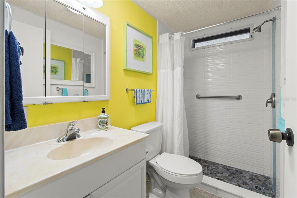 148 Nightingale Circle Ellenton, FL 34222 - Photo 20 of 47 a bathroom with a sink toilet and shower