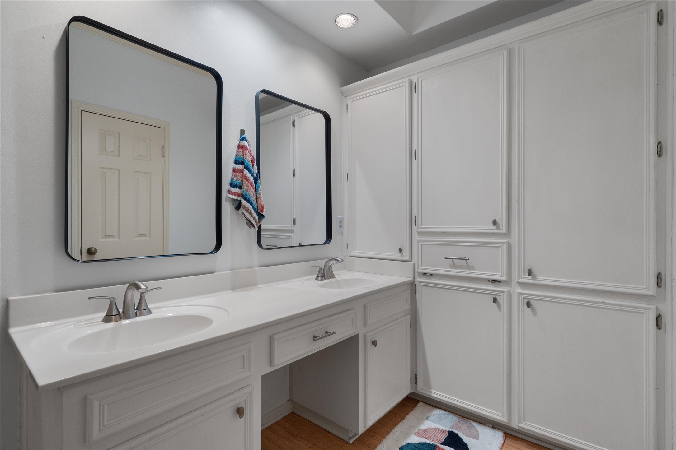 3840 Far W Boulevard, Unit 206 Austin, TX 78731 - Photo 13 of 20 The primary's ensuite features a wet room with dual vanities.