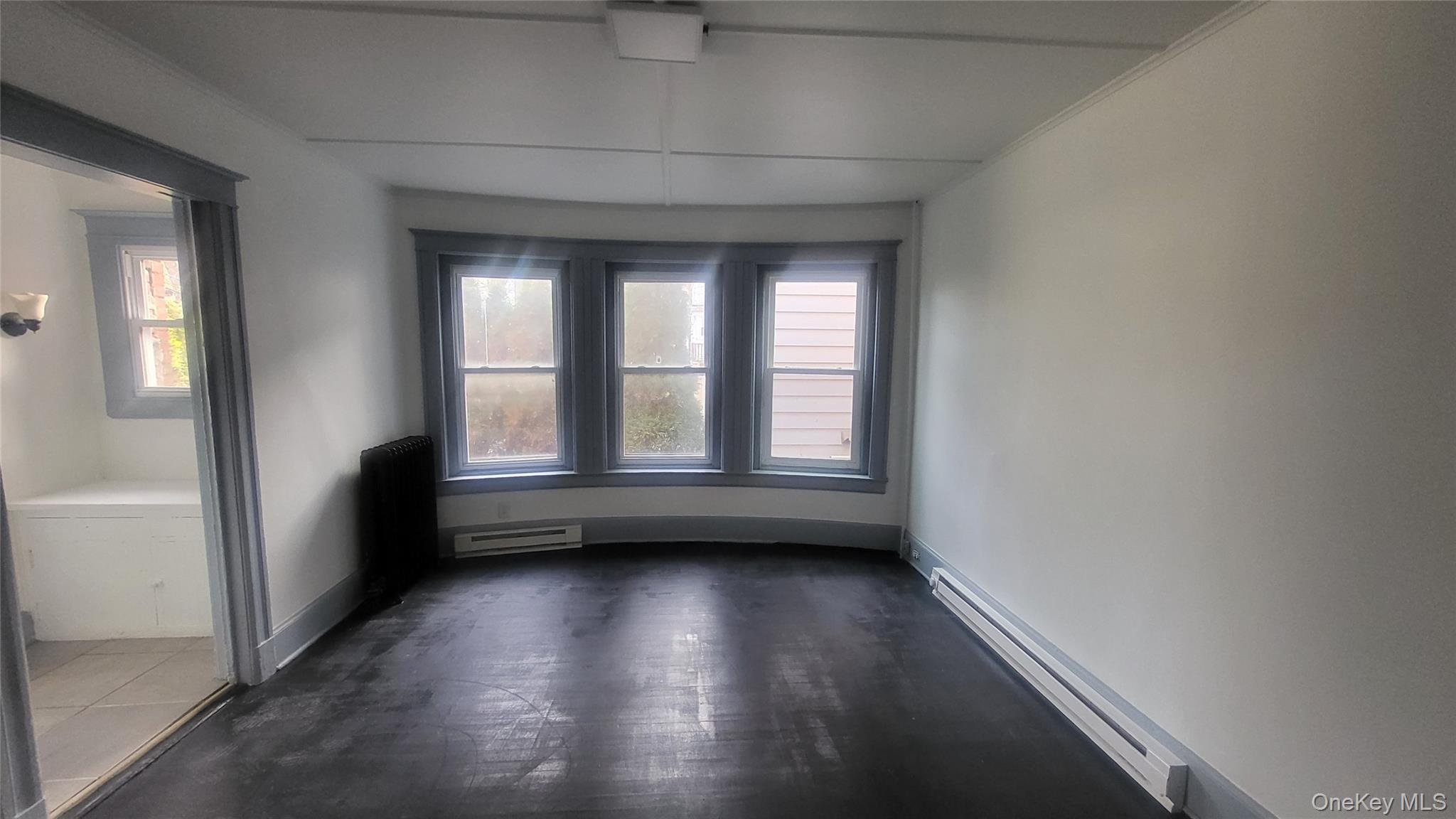 76 South Hamilton Street, Unit 2 Poughkeepsie, NY 12601 - Photo 11 of 19 a view of room with window and hardwood floor