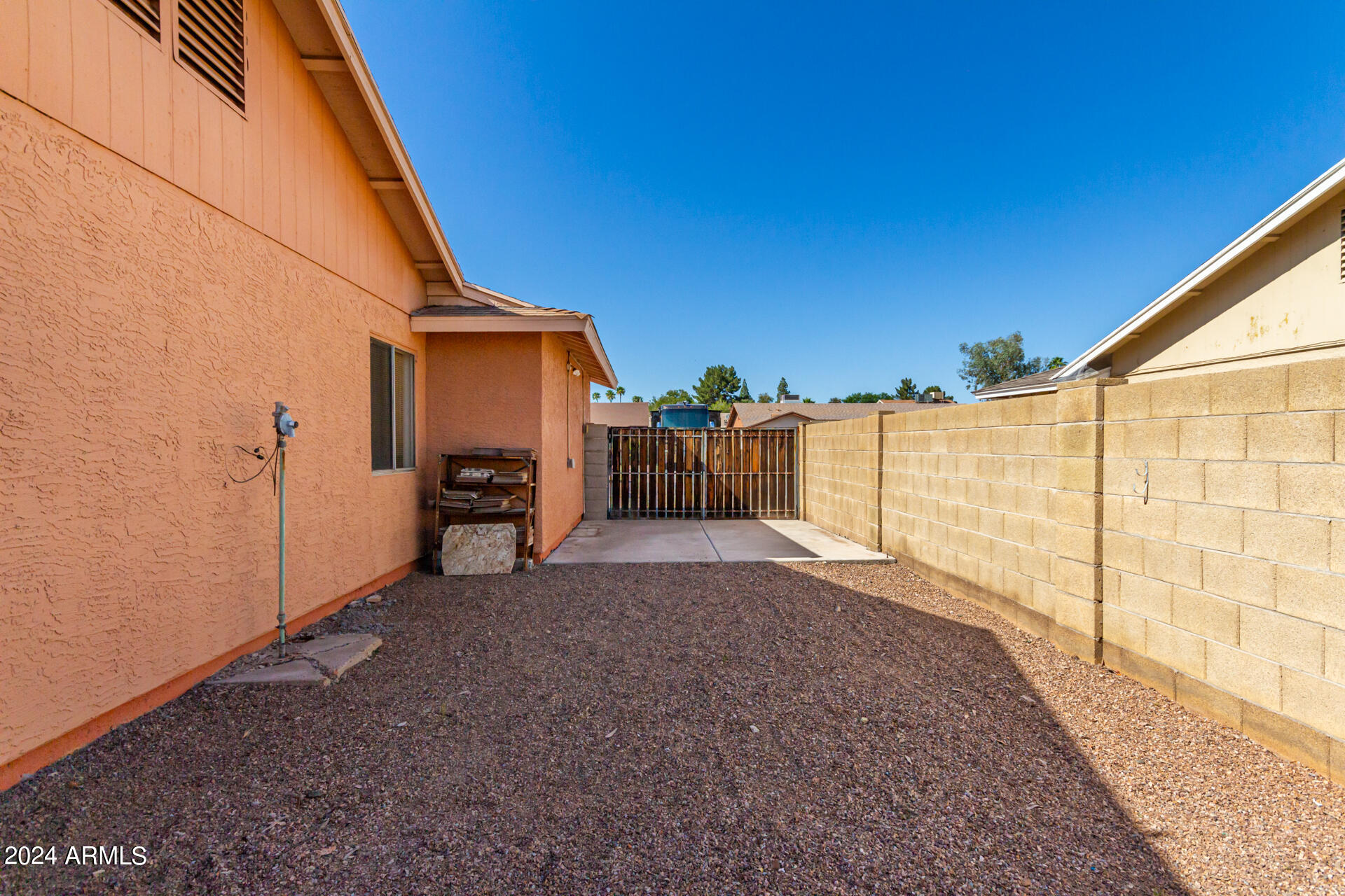 4825 East Pearce Road Phoenix, AZ 85044 - Photo 49 of 50 Side yard w RV gate