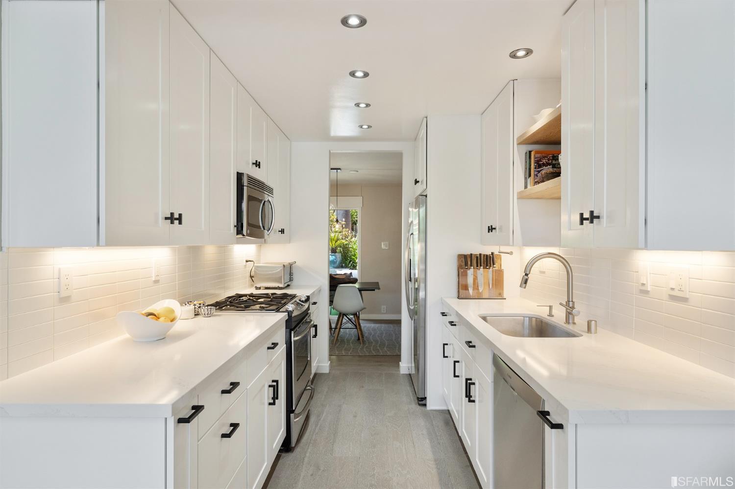 66 Amethyst Way San Francisco, CA 94131 - Photo 12 of 62 At the other end of the kitchen lies the formal dining area.