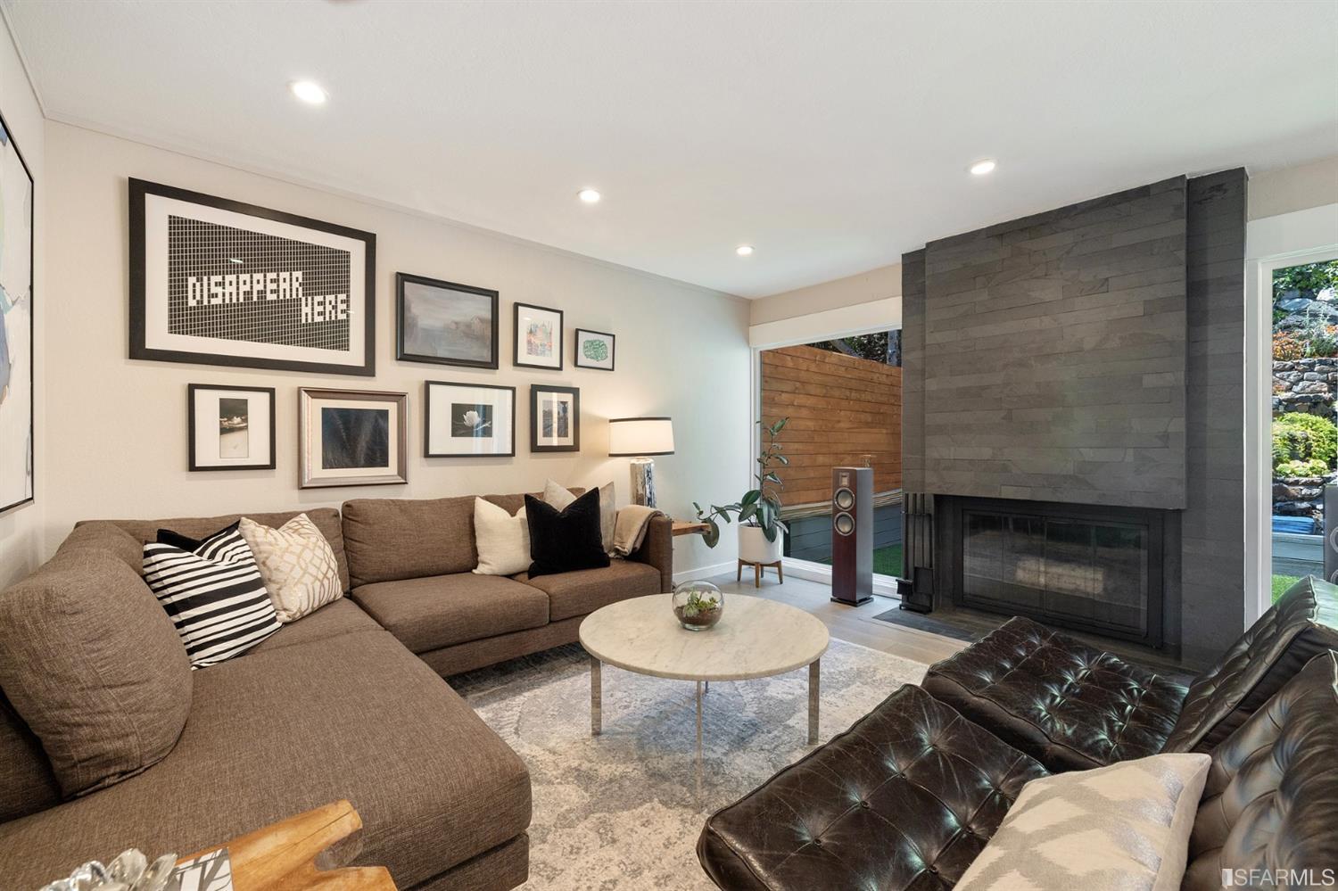 66 Amethyst Way San Francisco, CA 94131 - Photo 17 of 62 A gorgeous fireplace lies at the center of the formal living room.