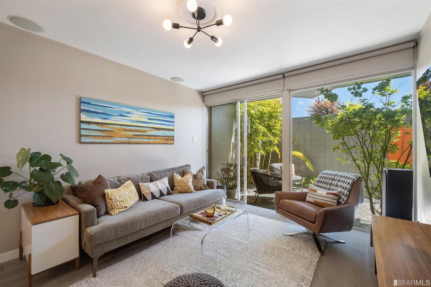 66 Amethyst Way San Francisco, CA 94131 - Photo 7 of 62 At the front of home adjacent to the patio lies this comfortable family room, perfect for a den or to relax in front of the TV.