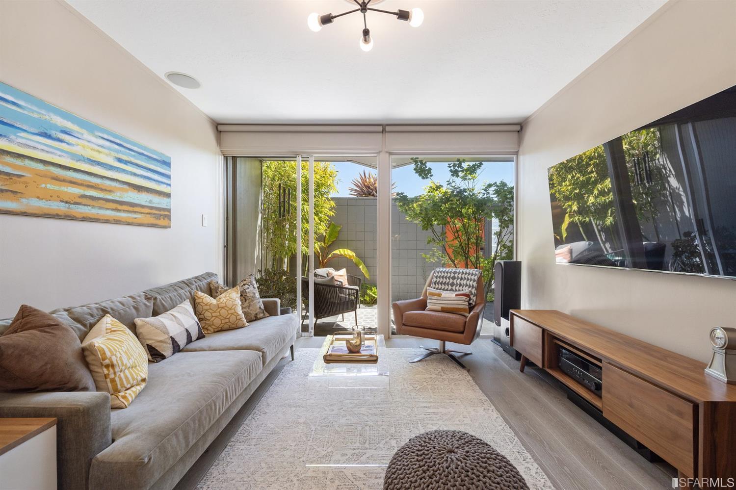 66 Amethyst Way San Francisco, CA 94131 - Photo 8 of 62 A sliding glass door leads conveniently to the patio from the family room.