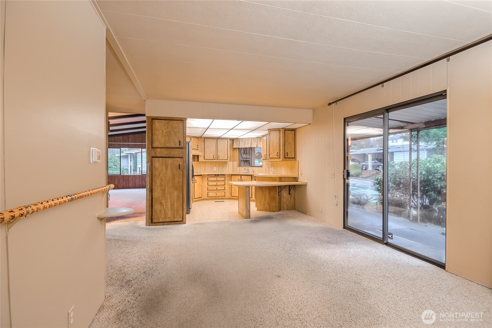 201 Union Avenue Southeast, Unit 112 Renton, WA 98059 - Photo 13 of 35 a view of kitchen with furniture and refrigerator