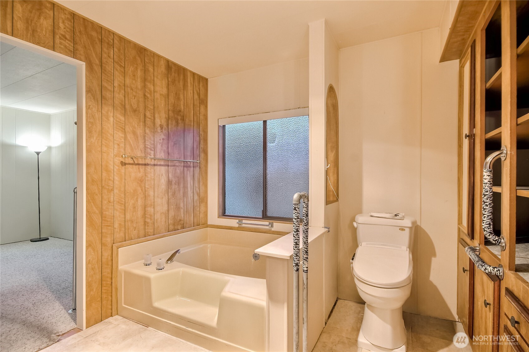 201 Union Avenue Southeast, Unit 112 Renton, WA 98059 - Photo 17 of 35 a bathroom with a granite countertop sink toilet and shower