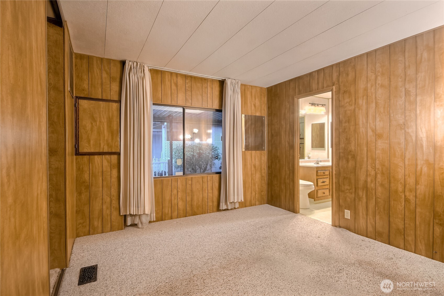 201 Union Avenue Southeast, Unit 112 Renton, WA 98059 - Photo 18 of 35 a view of a bathroom with a tub and shower curtain