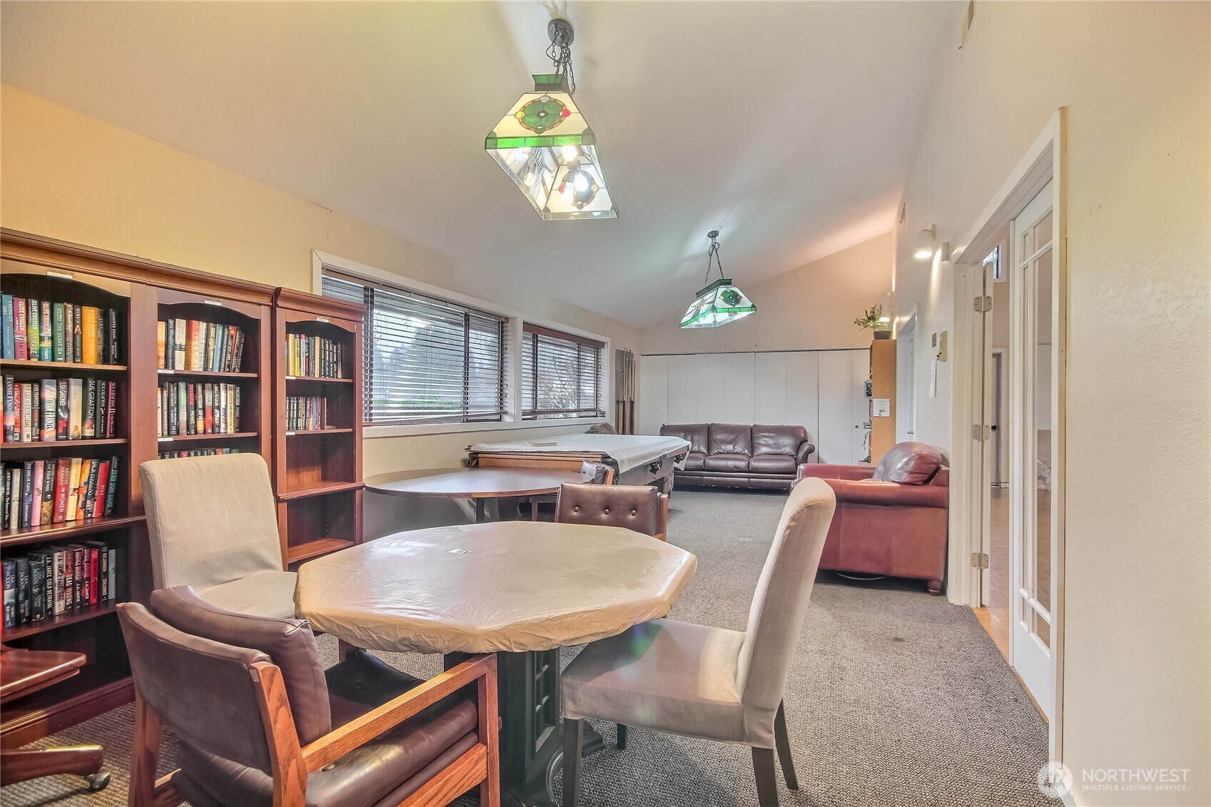 201 Union Avenue Southeast, Unit 112 Renton, WA 98059 - Photo 28 of 35 a view of a dining room with furniture a rug and wooden floor