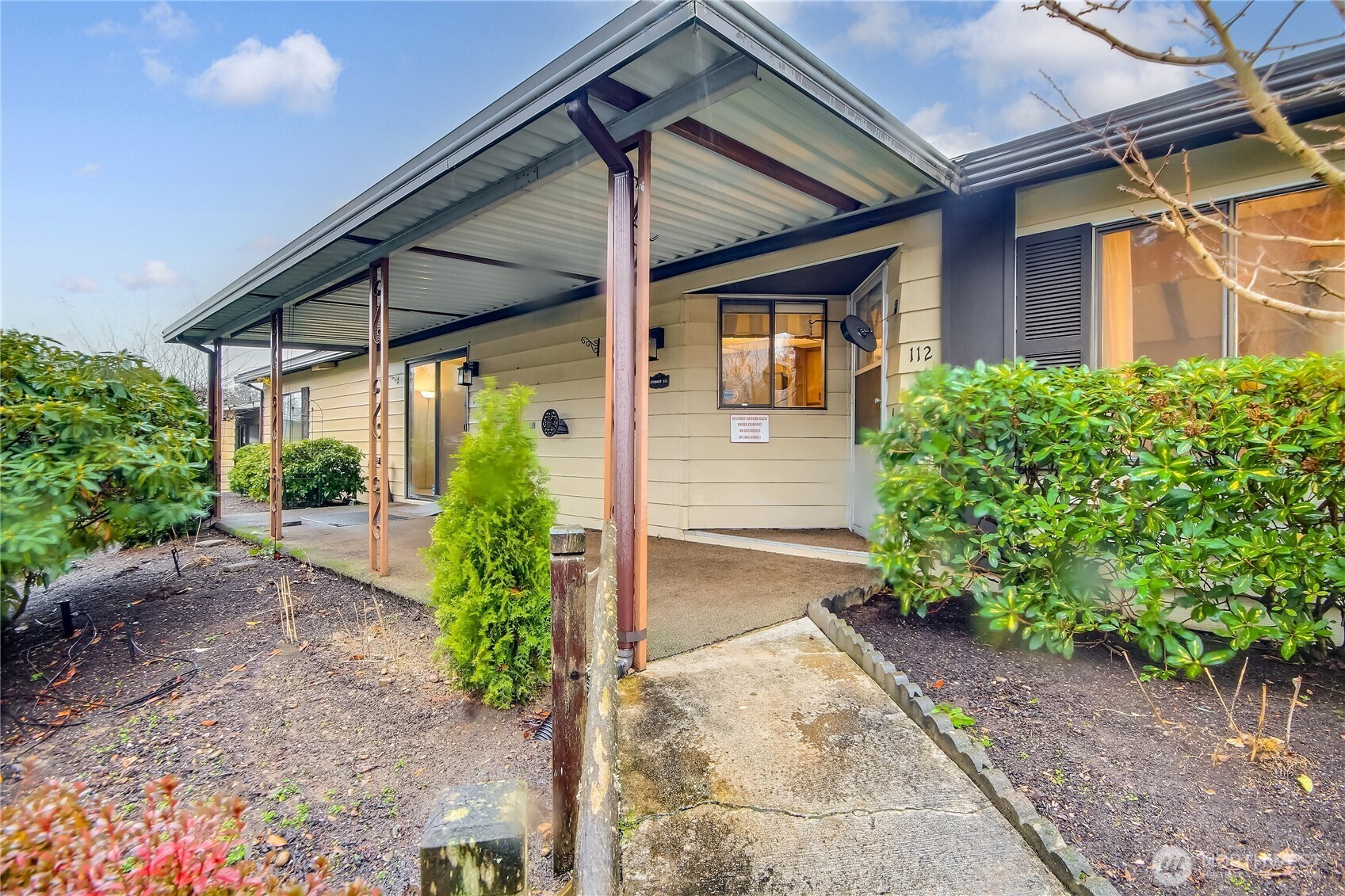 201 Union Avenue Southeast, Unit 112 Renton, WA 98059 - Photo 3 of 35 a view of a backyard with garden