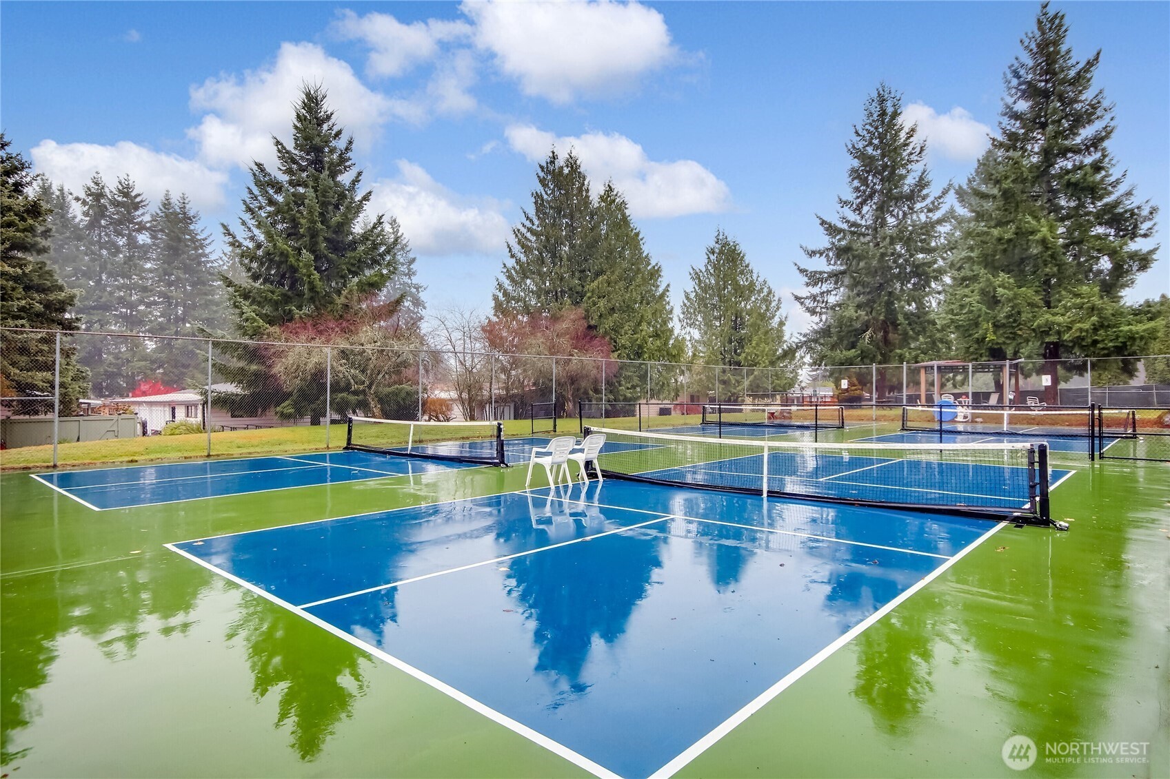 201 Union Avenue Southeast, Unit 112 Renton, WA 98059 - Photo 31 of 35 a view of a swimming pool with a yard