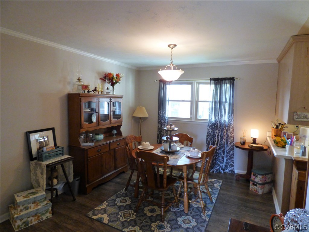 921 Yorkshire Road Colonial Heights, VA 23834 - Photo 4 of 22 a view of a dining room with furniture and chandelier