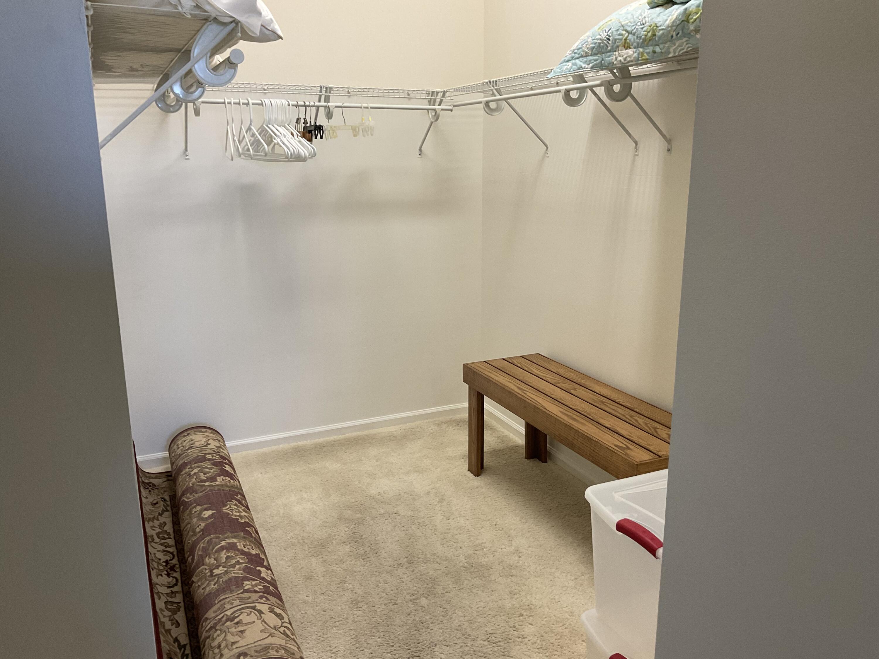 364 Sunview Way Port St. Lucie, FL 34986 - Photo 14 of 34 a view of a room with racks on the wall